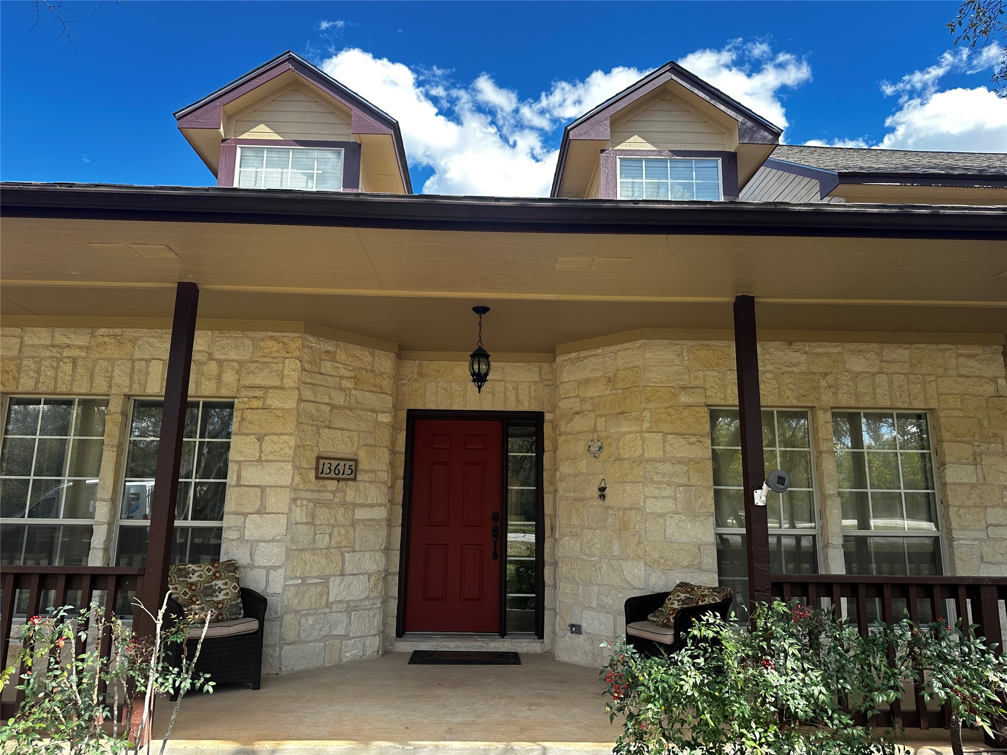 13615 Copperleaf Trail Manchaca, TX 78652 - Photo 3 of 39 Property entrance featuring a porch and stone siding