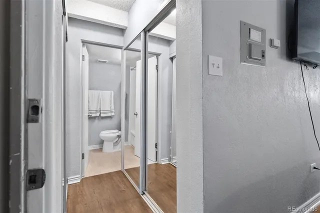 a view of a bathroom from a hallway