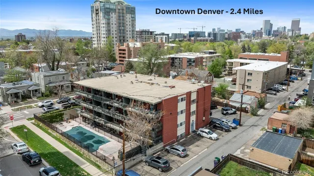 a view of a city with tall buildings