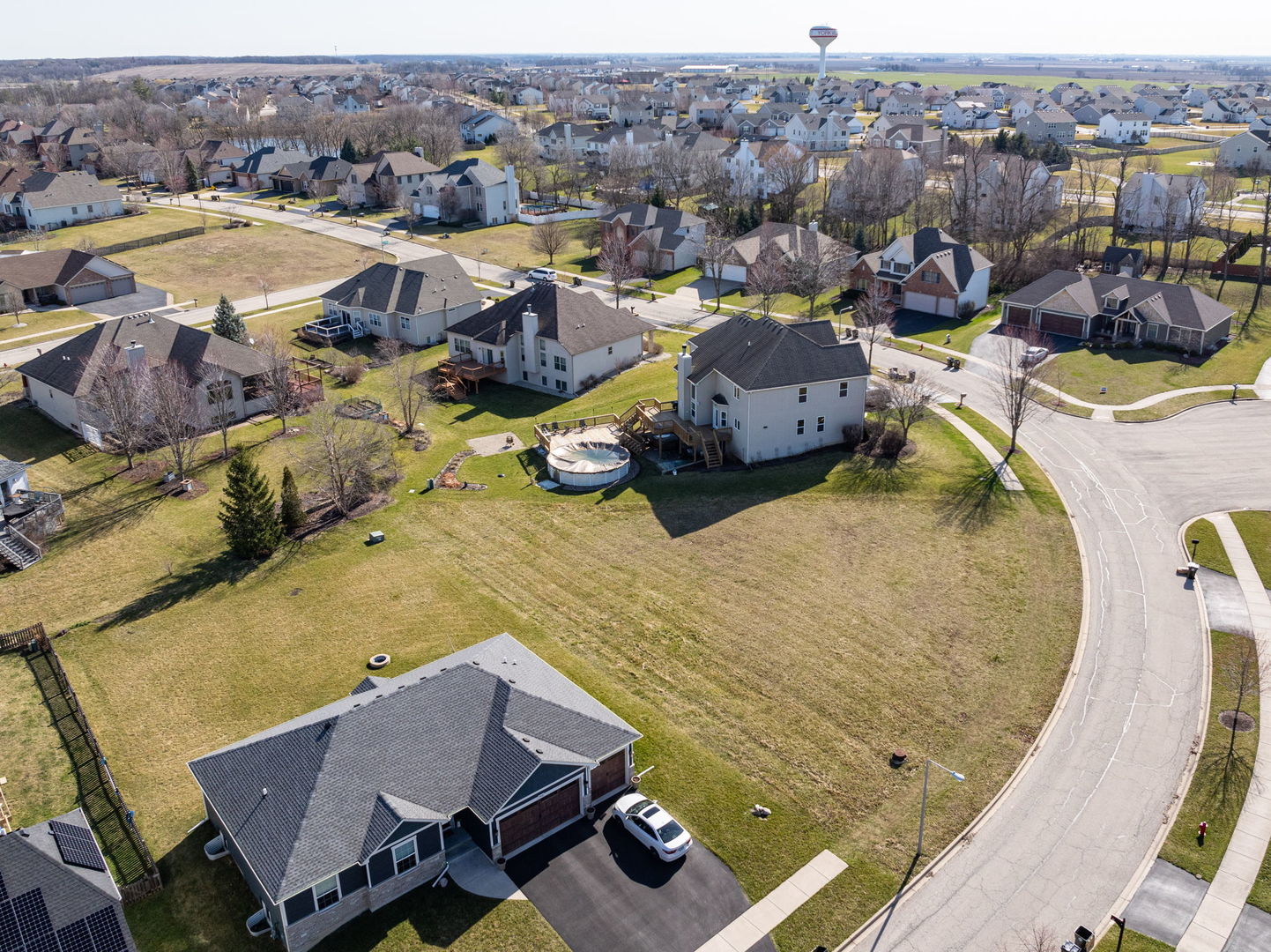 762 Greenfield Turn Yorkville, IL 60560 - Photo 7 of 9 a view of a swimming pool with lounge chairs