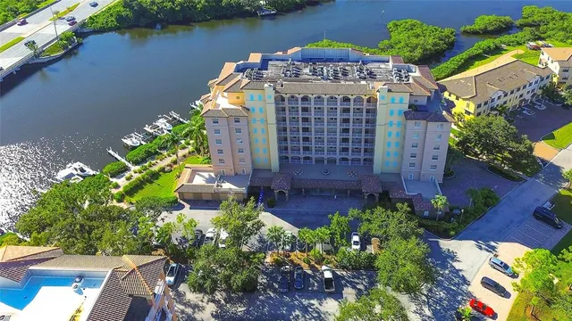 an aerial view of a city and lake view
