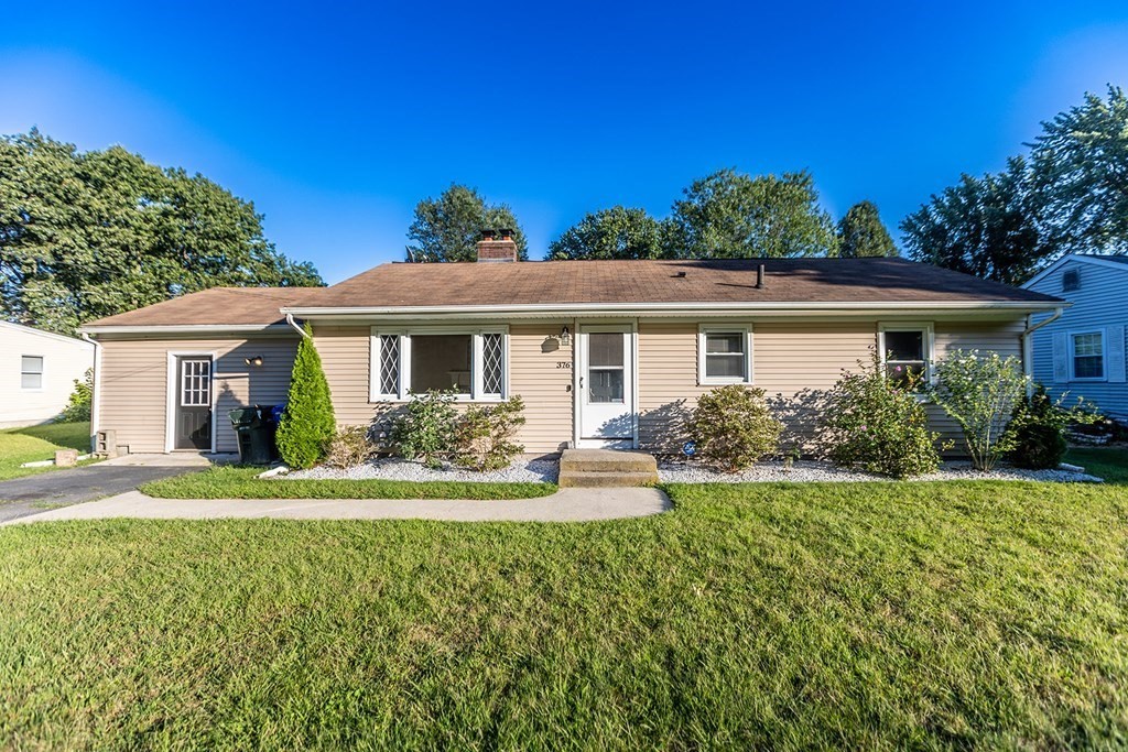 376 Hermitage Drive Springfield, MA 01129 - Photo 1 of 34 a front view of a house with a yard