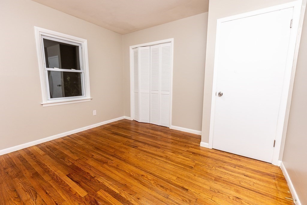 376 Hermitage Drive Springfield, MA 01129 - Photo 15 of 34 a view of empty room with wooden floor