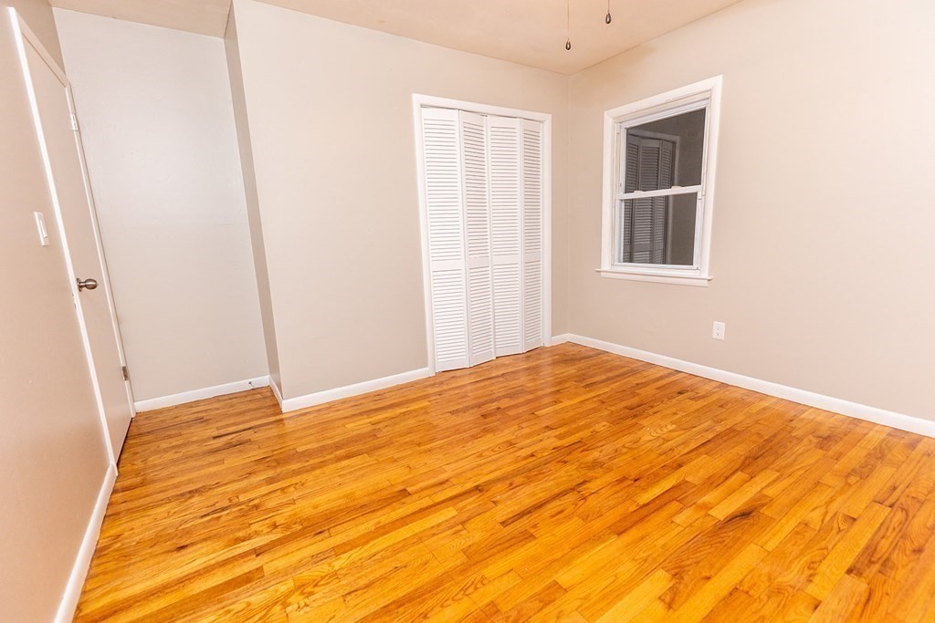 376 Hermitage Drive Springfield, MA 01129 - Photo 22 of 34 a view of empty room with wooden floor