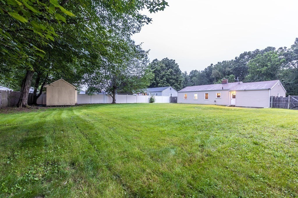 376 Hermitage Drive Springfield, MA 01129 - Photo 33 of 34 a view of a house with a yard and a sitting area
