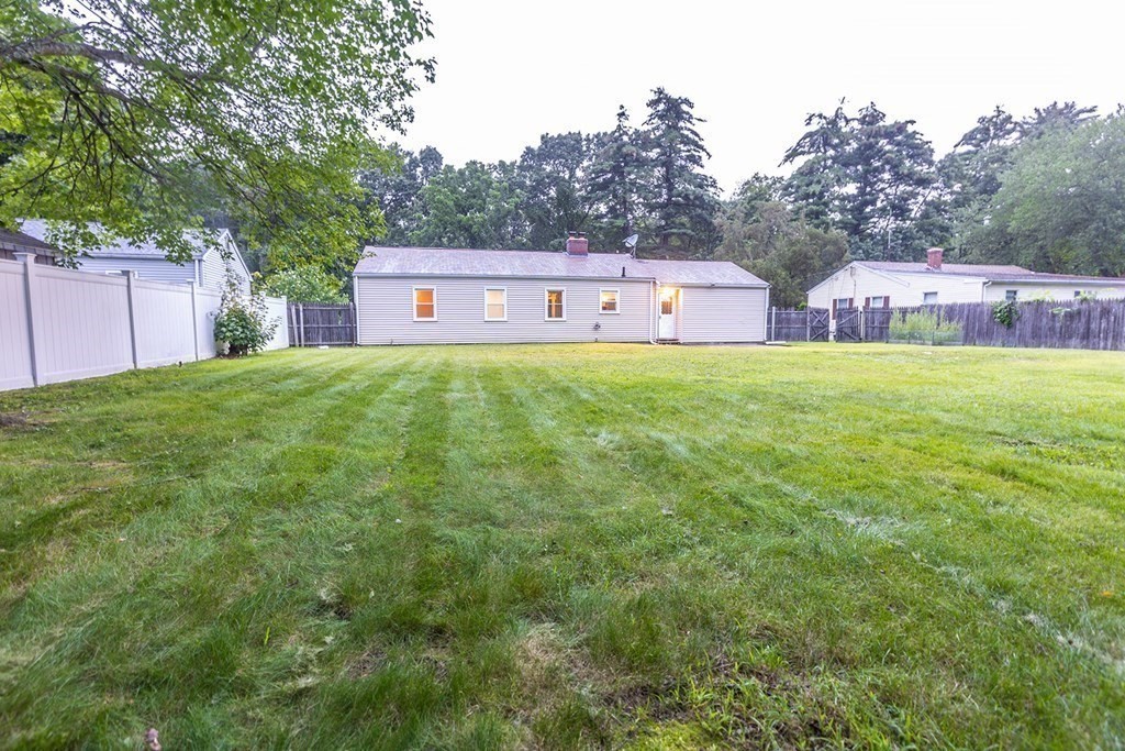 376 Hermitage Drive Springfield, MA 01129 - Photo 34 of 34 a front view of house with yard and trees