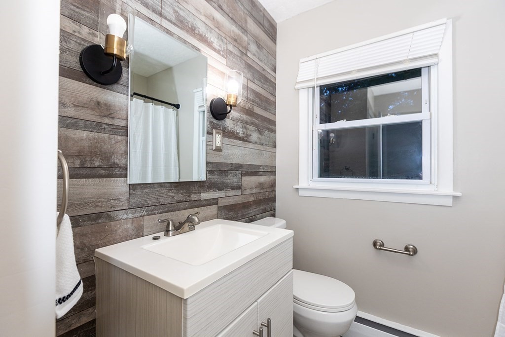 376 Hermitage Drive Springfield, MA 01129 - Photo 9 of 34 a bathroom with a sink toilet and mirror
