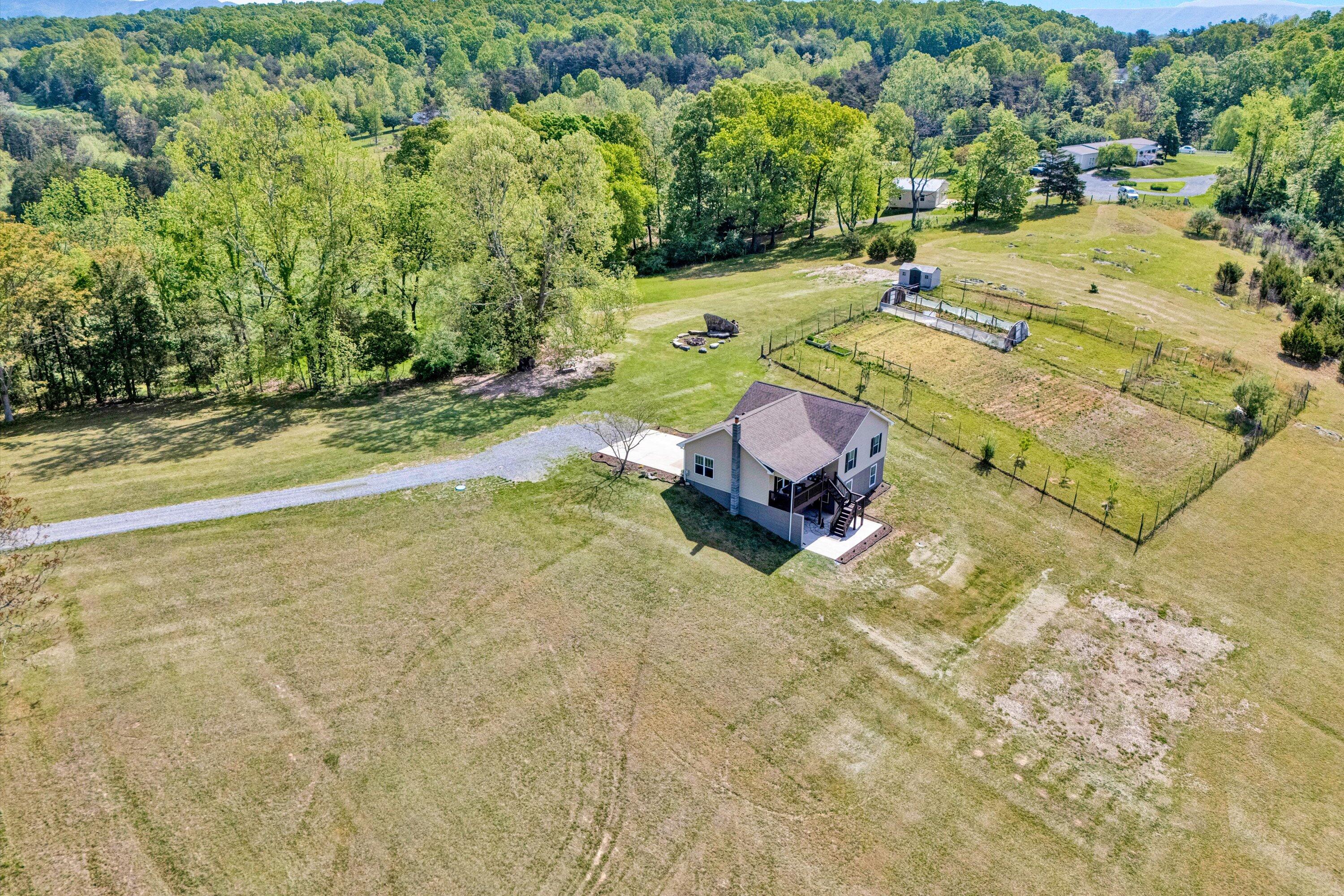 1410 Flowing Spring Road Buchanan, VA 24066 - Photo 2 of 63 02-DJI_20250429105817_0055