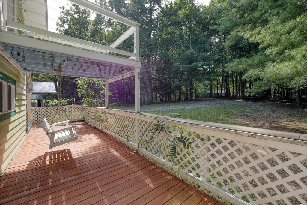 51 Cold Springs Trail Morganton, GA 30560 - Photo 27 of 40 a view of a chairs and table on the wooden floor