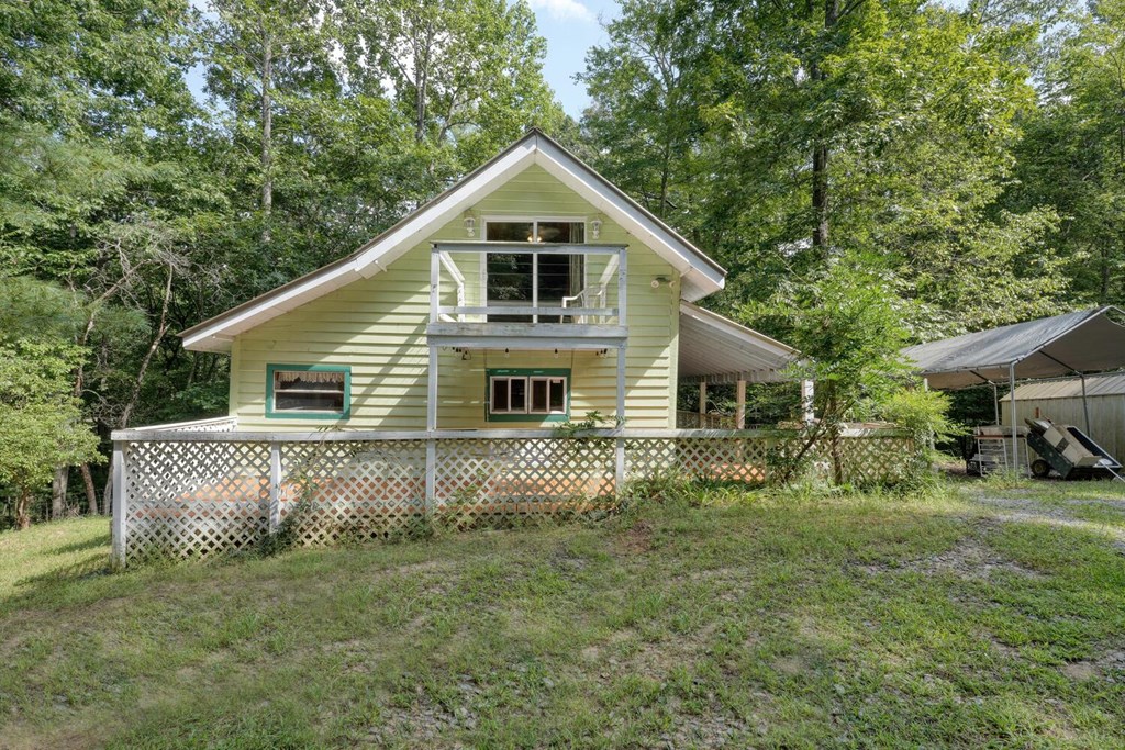 51 Cold Springs Trail Morganton, GA 30560 - Photo 30 of 40 a view of a house with a yard