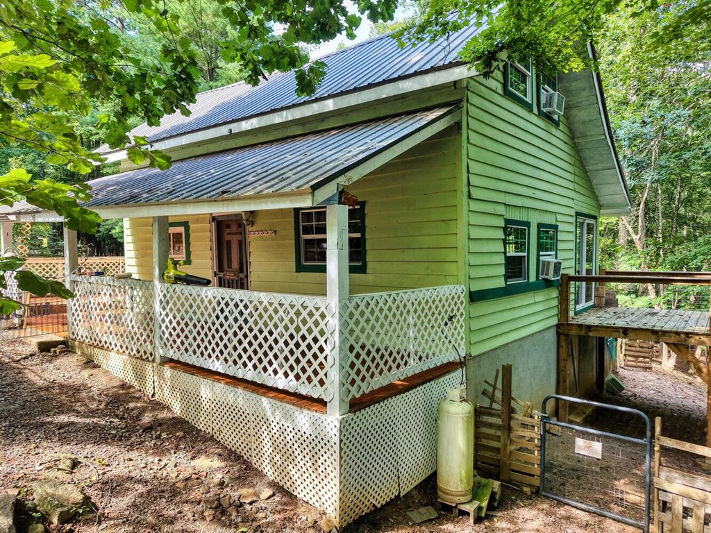 51 Cold Springs Trail Morganton, GA 30560 - Photo 6 of 40 a view of a house with a deck