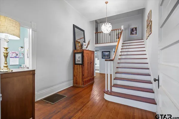 a bathroom with a tub and a sink