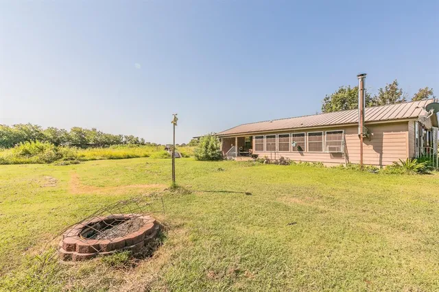 a view of a house with a ocean view