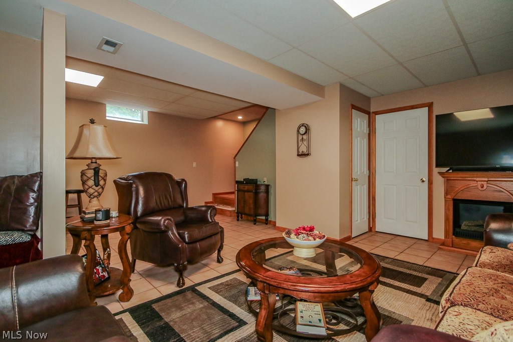 1966 Spring Grove Madison, OH 44057 - Photo 21 of 50 This lower level Family Room is great for gatherings