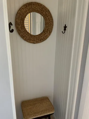 a view of a balcony with furniture