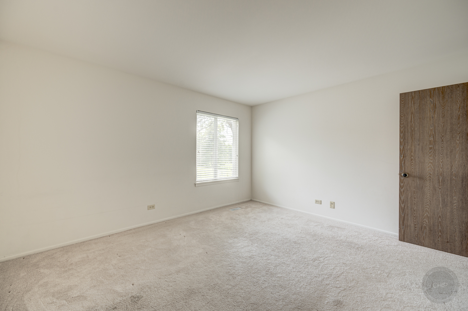 360 Springlake Lane, Unit B Aurora, IL 60504 - Photo 19 of 26 an empty room with windows