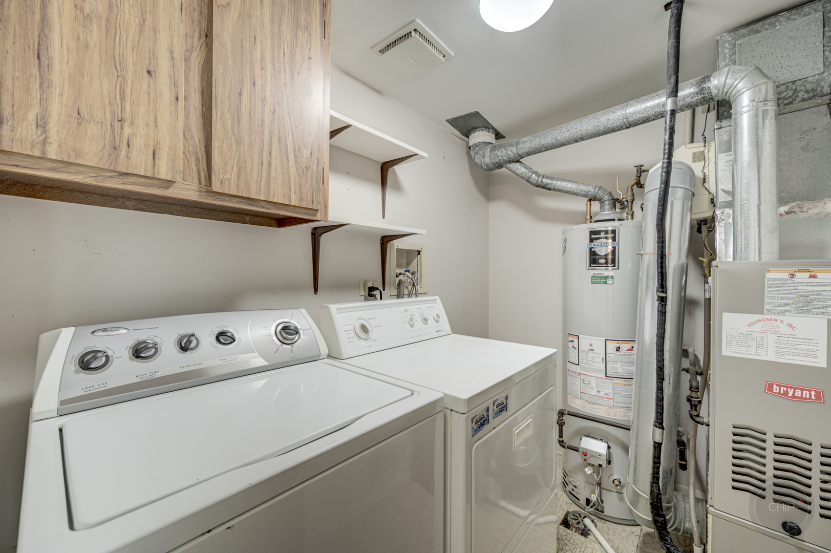 360 Springlake Lane, Unit B Aurora, IL 60504 - Photo 22 of 26 a utility room with dryer and washer