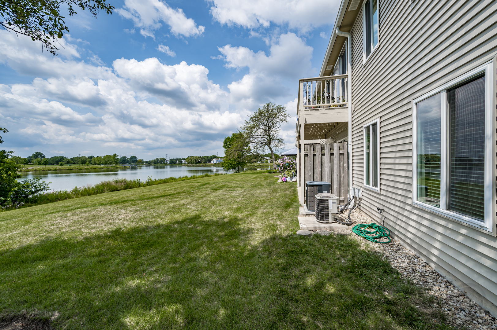 360 Springlake Lane, Unit B Aurora, IL 60504 - Photo 24 of 26 a house view with a garden space