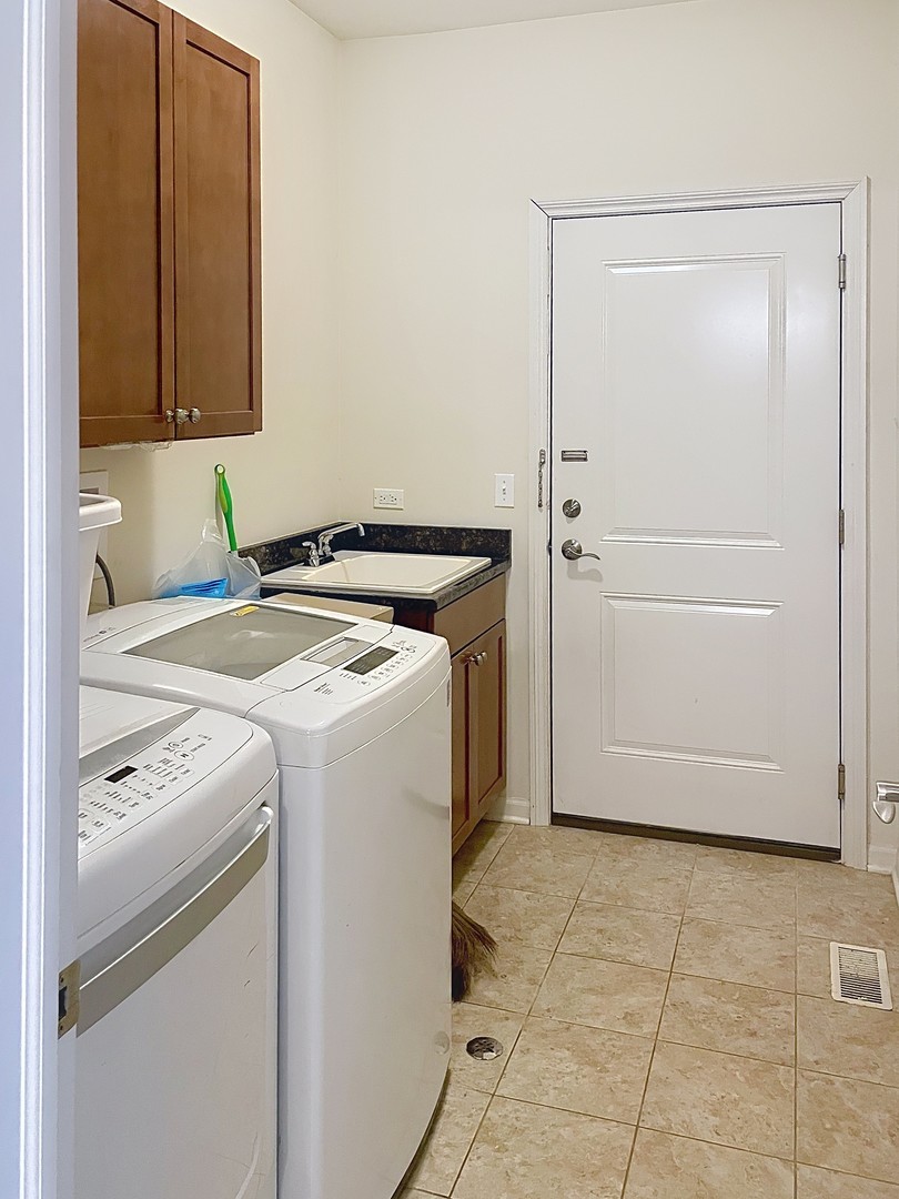 2018 Shermer Road, Unit 2018 Glenview, IL 60026 - Photo 36 of 39 a utility room with dryer and washer