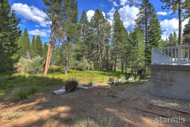 1429 Chinquapin Drive South Lake Tahoe, CA 96150 - Photo 34 of 37 a view of a yard with swimming pool and sitting area