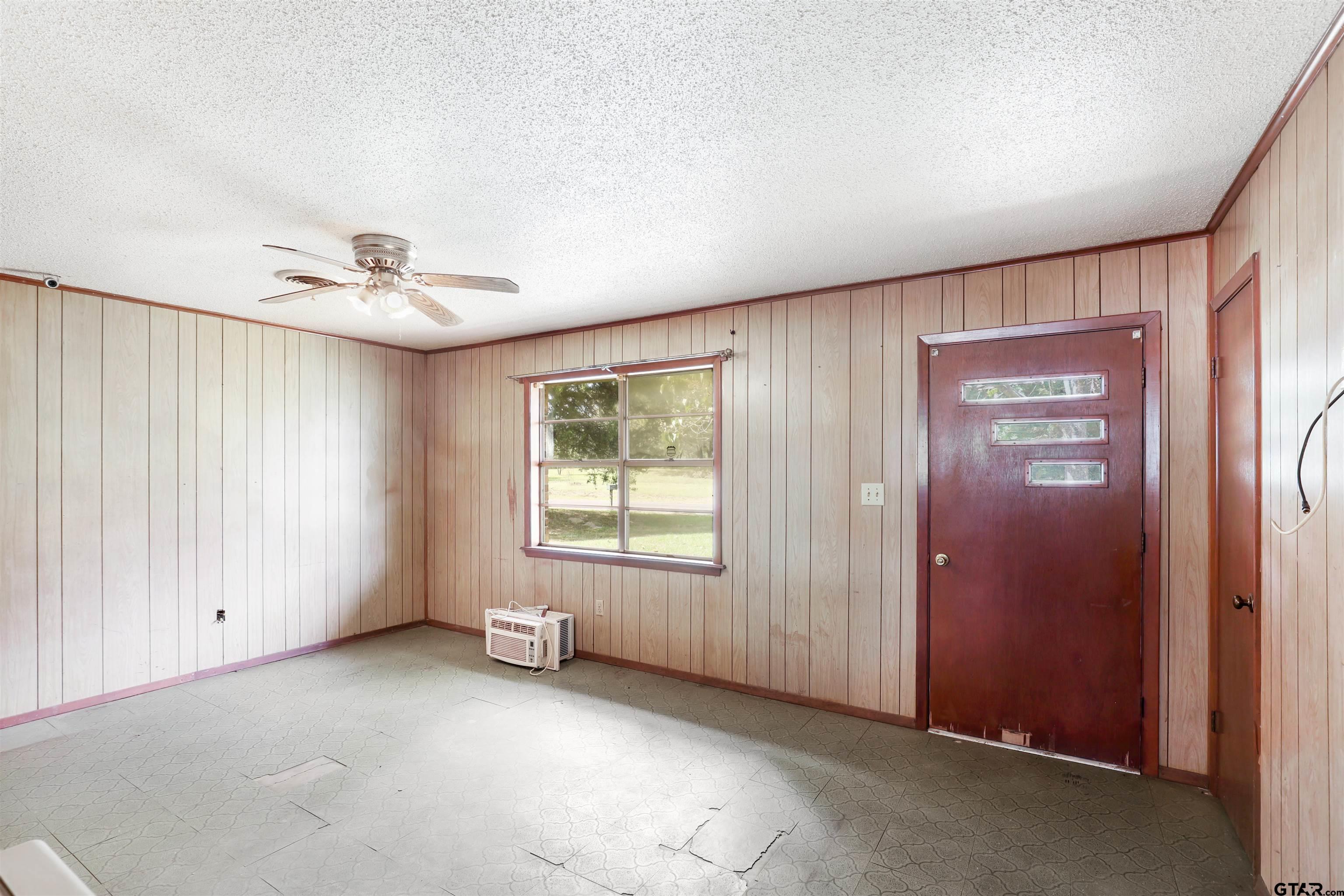 11768 Rose Trail Pittsburg, TX 75686 - Photo 11 of 20 an empty room with windows and closet
