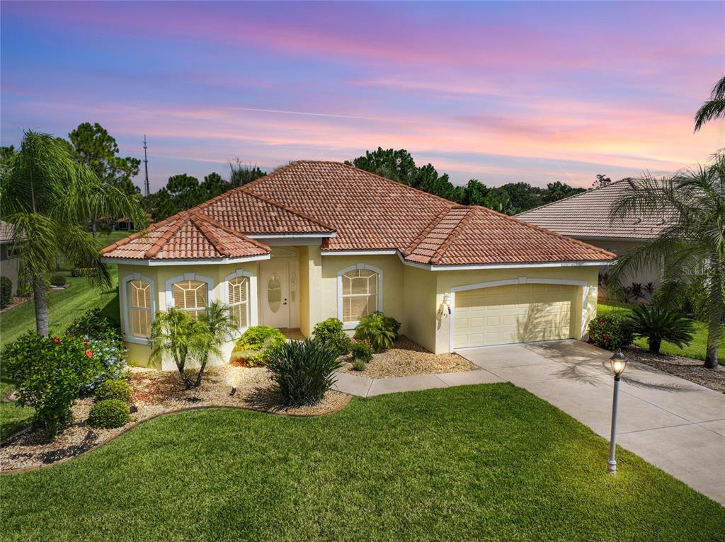 2443 Silver Palm Road North Port, FL 34288 - Photo 1 of 1 Front of home at Dusk