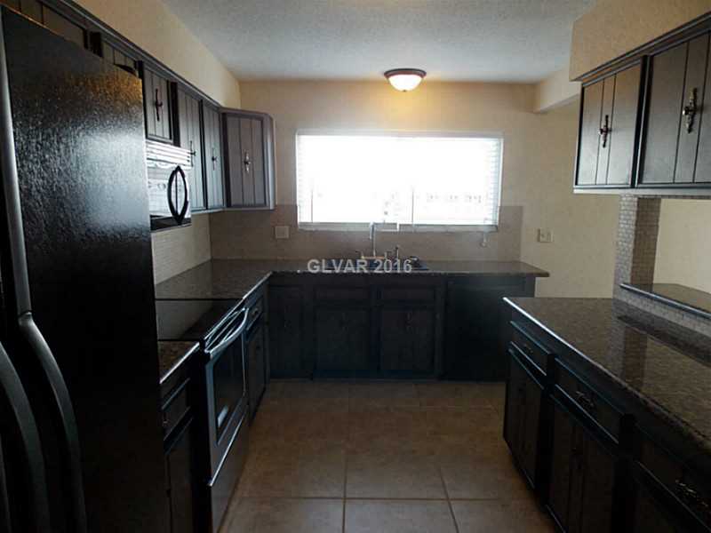 709 Altamira Road Las Vegas, NV 89145 - Photo 8 of 31 Kitchen.