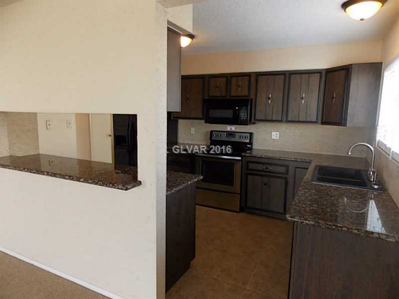 709 Altamira Road Las Vegas, NV 89145 - Photo 9 of 31 Kitchen.