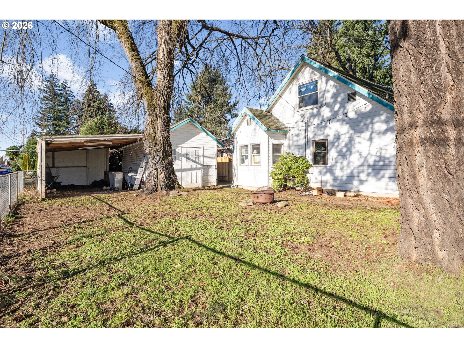 1601 Southeast 130th Avenue Portland, OR 97233 - Photo 22 of 35 a view of house with backyard and trees