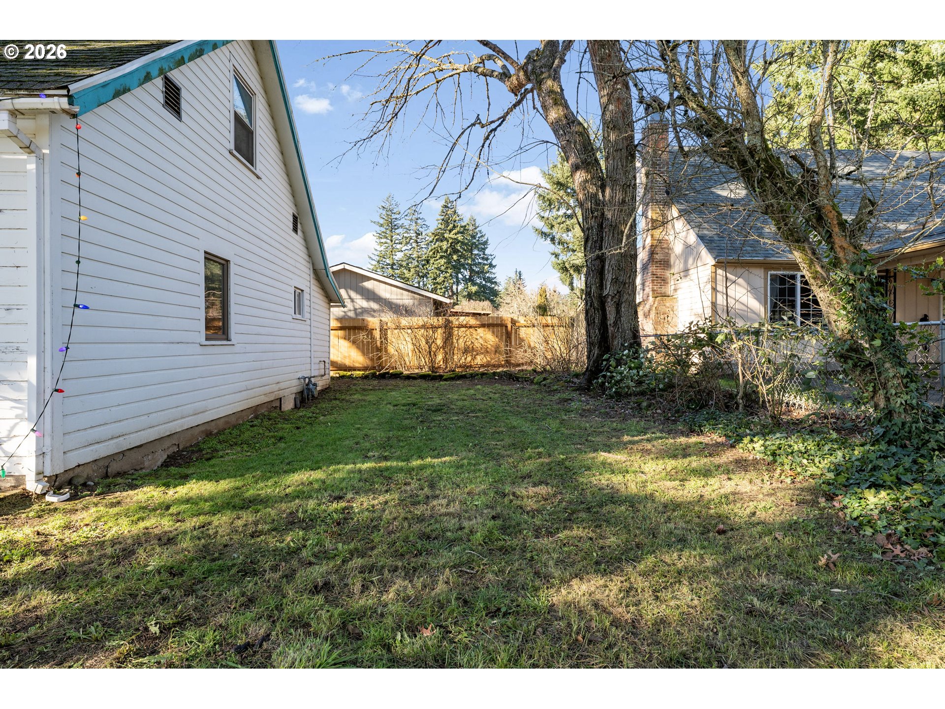 1601 Southeast 130th Avenue Portland, OR 97233 - Photo 29 of 35 a backyard of a house with lots of green space