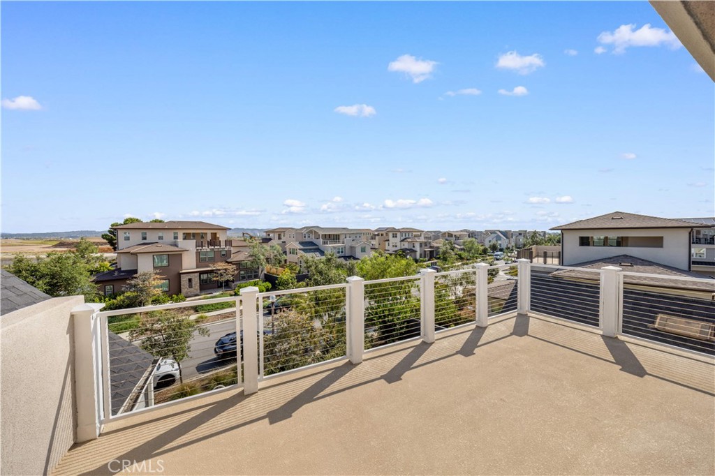 a view of a balcony with an outdoor space