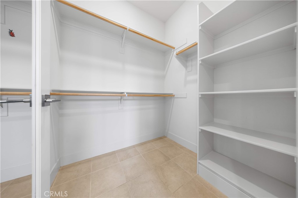 125 Character Irvine, CA 92618 - Photo 28 of 74 a view of an empty walk in closet