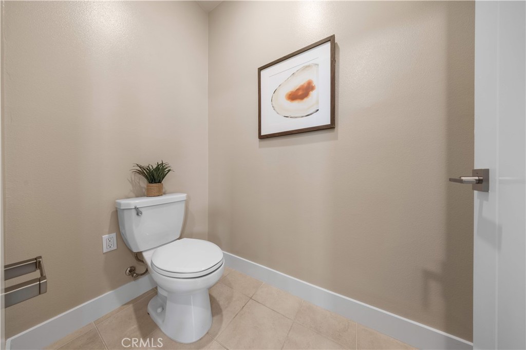125 Character Irvine, CA 92618 - Photo 29 of 74 a white toilet sitting next to a small bathroom