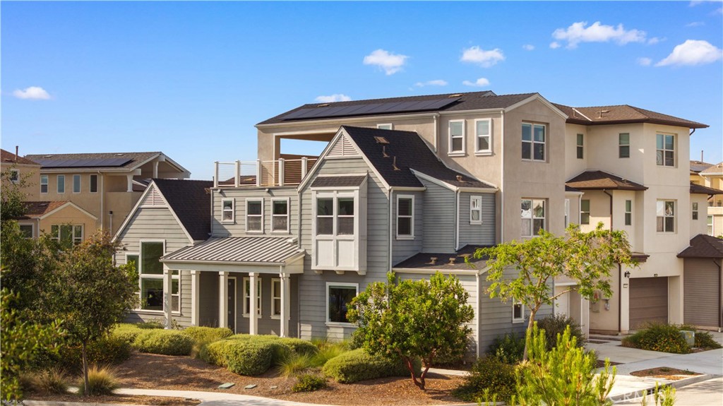 125 Character Irvine, CA 92618 - Photo 4 of 74 a front view of a residential houses