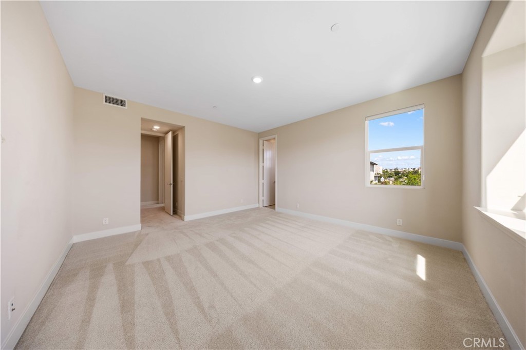 125 Character Irvine, CA 92618 - Photo 45 of 74 a view of an empty room with a window
