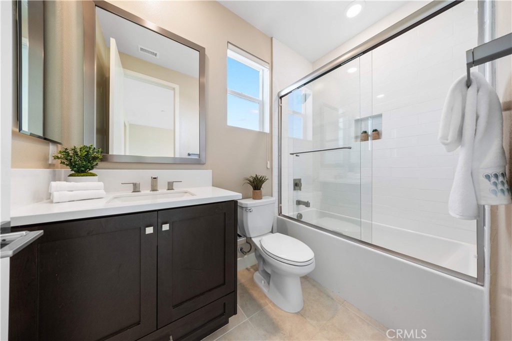 125 Character Irvine, CA 92618 - Photo 46 of 74 a bathroom with a sink toilet and shower