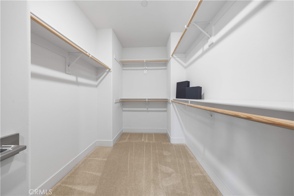 125 Character Irvine, CA 92618 - Photo 53 of 74 a view of a kitchen with white cabinets