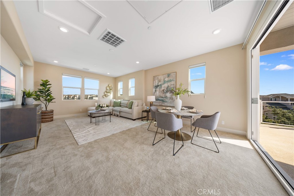125 Character Irvine, CA 92618 - Photo 57 of 74 a living room with furniture and a large window