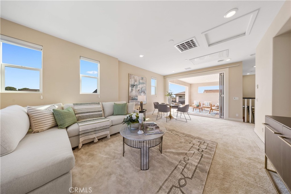 125 Character Irvine, CA 92618 - Photo 59 of 74 a living room with furniture and a large window