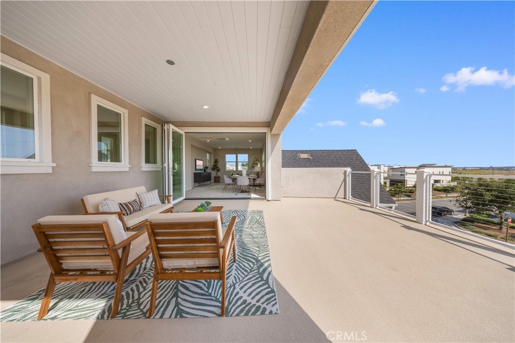 125 Character Irvine, CA 92618 - Photo 63 of 74 a bedroom with furniture and a floor to ceiling window