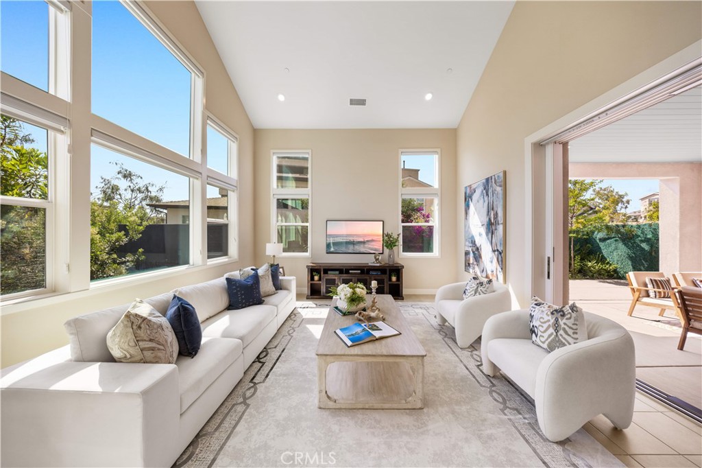 125 Character Irvine, CA 92618 - Photo 7 of 74 a living room with furniture and a large window
