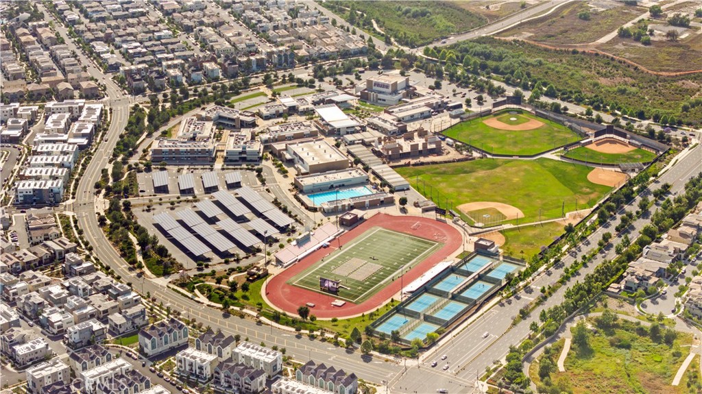 125 Character Irvine, CA 92618 - Photo 72 of 74 an aerial view of a pool patio and mountain view