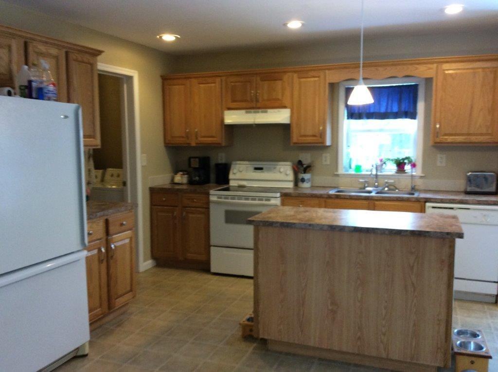 31 A Dixon Road Wales, ME 04280 - Photo 5 of 29 KITCHEN VIEW FROM LIVING ROOM