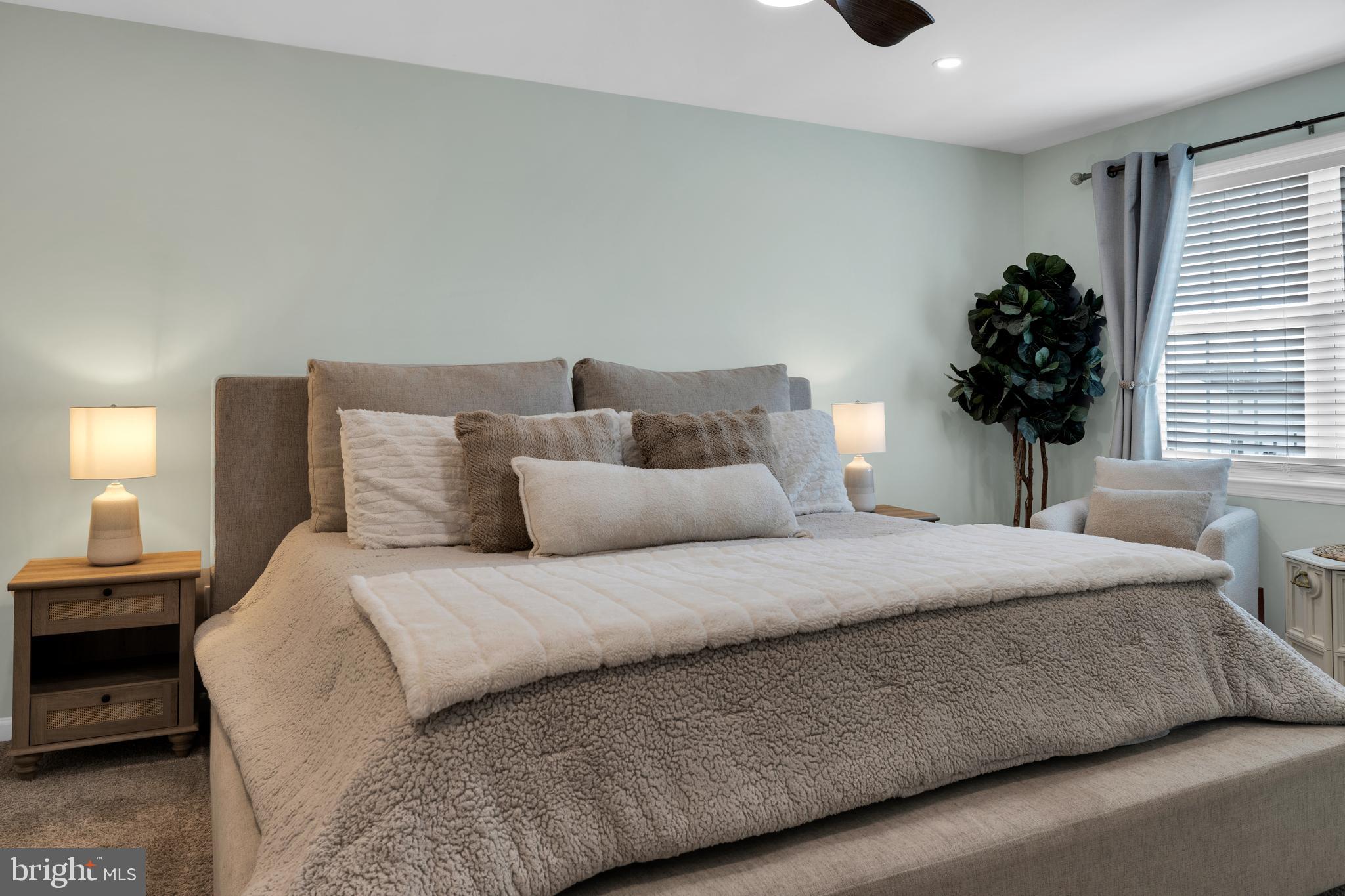 1548 Huron Drive Sinking Spring, PA 19608 - Photo 17 of 32 a bedroom with a bed and a window