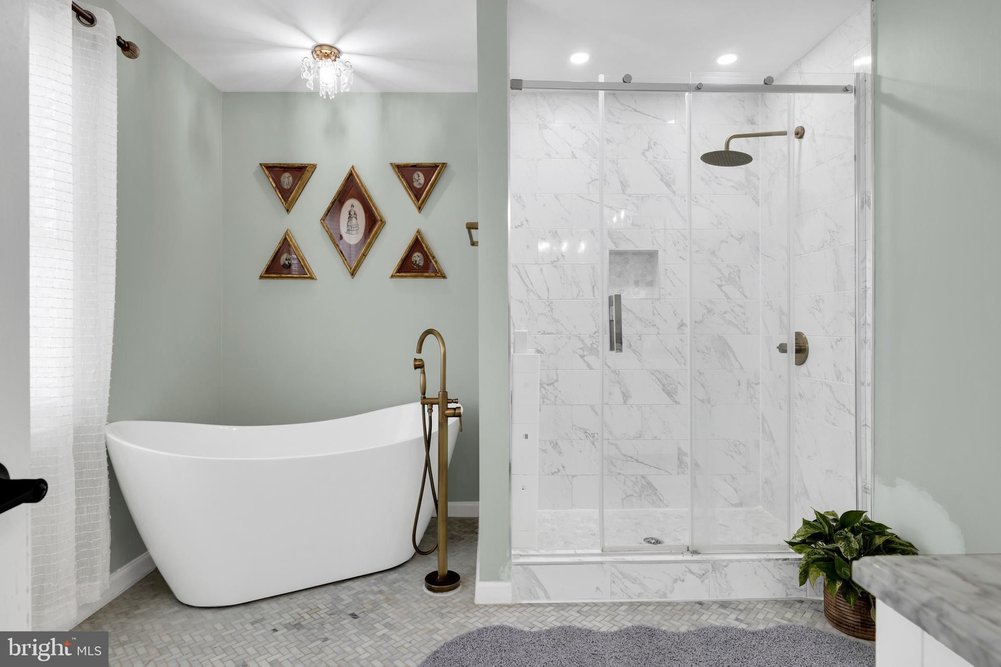 1548 Huron Drive Sinking Spring, PA 19608 - Photo 19 of 32 a bathroom with a bathtub and shower