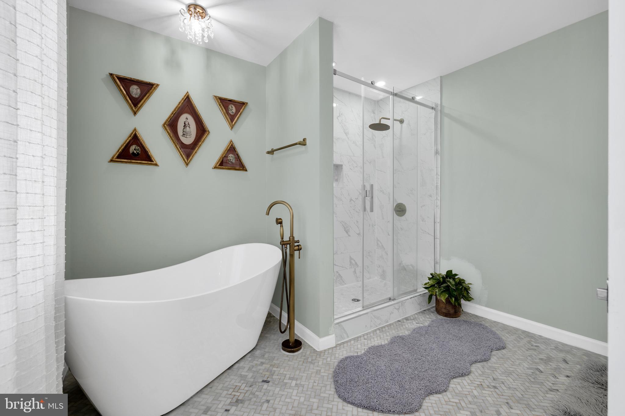 1548 Huron Drive Sinking Spring, PA 19608 - Photo 20 of 32 a bathroom with a tub and shower