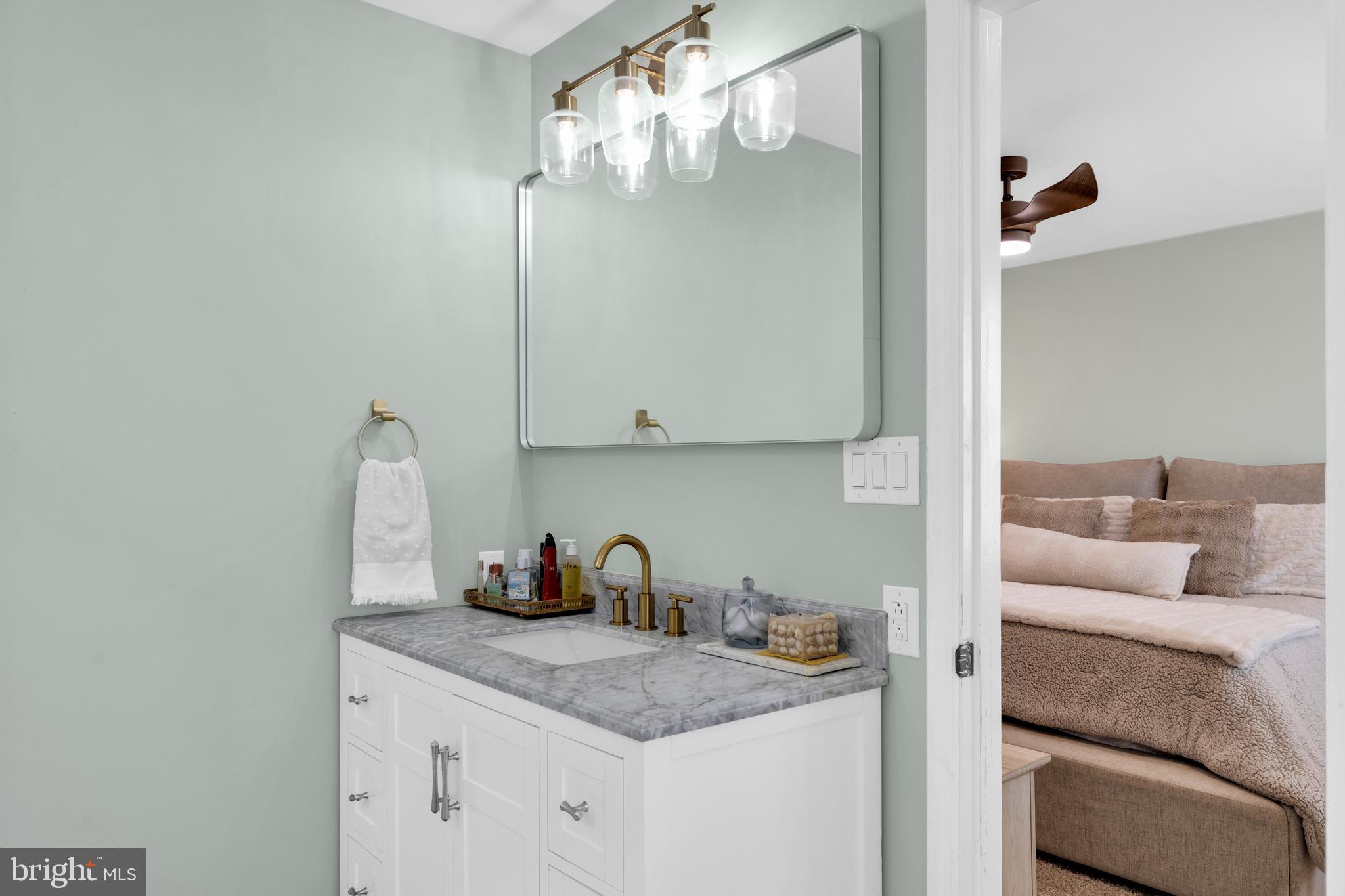 1548 Huron Drive Sinking Spring, PA 19608 - Photo 21 of 32 a living room with furniture and a chandelier