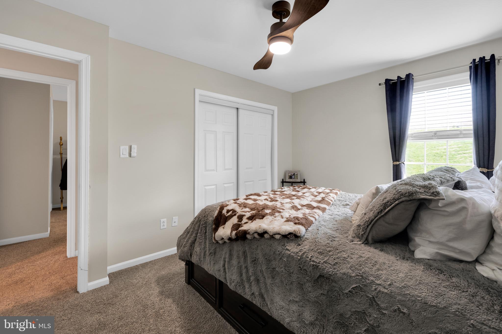 1548 Huron Drive Sinking Spring, PA 19608 - Photo 23 of 32 a bedroom with a bed and a window