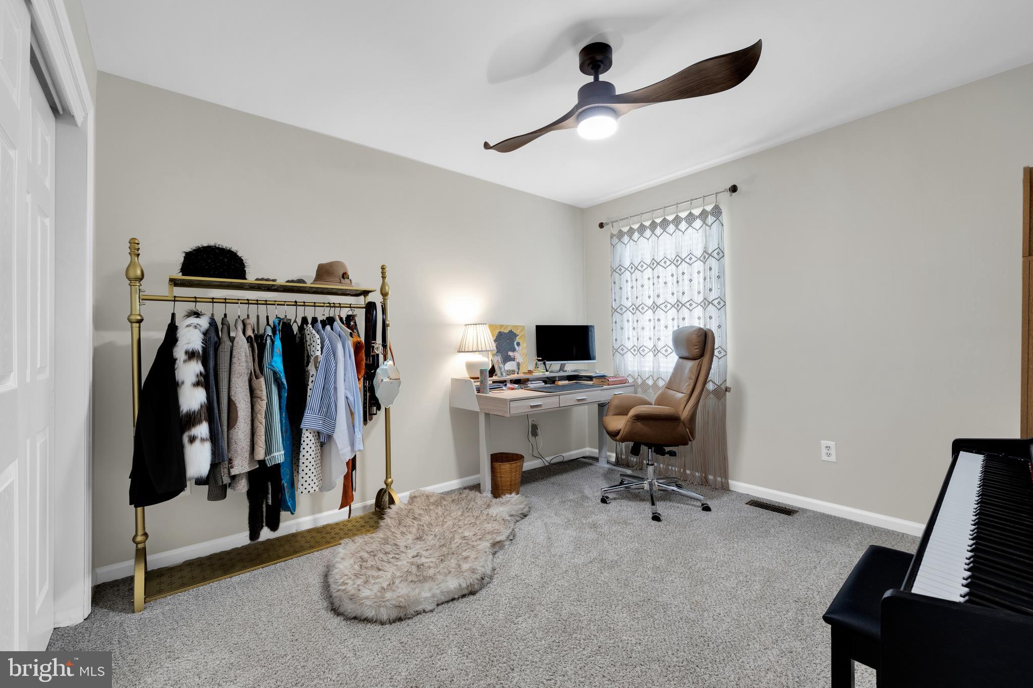 1548 Huron Drive Sinking Spring, PA 19608 - Photo 24 of 32 a view of a workspace with furniture and a window