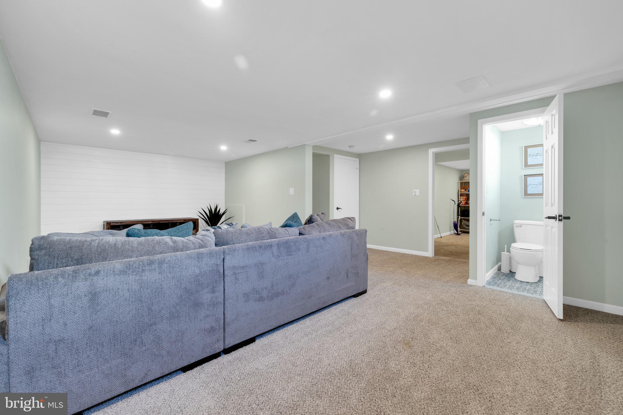 1548 Huron Drive Sinking Spring, PA 19608 - Photo 27 of 32 a living room with furniture and a chandelier